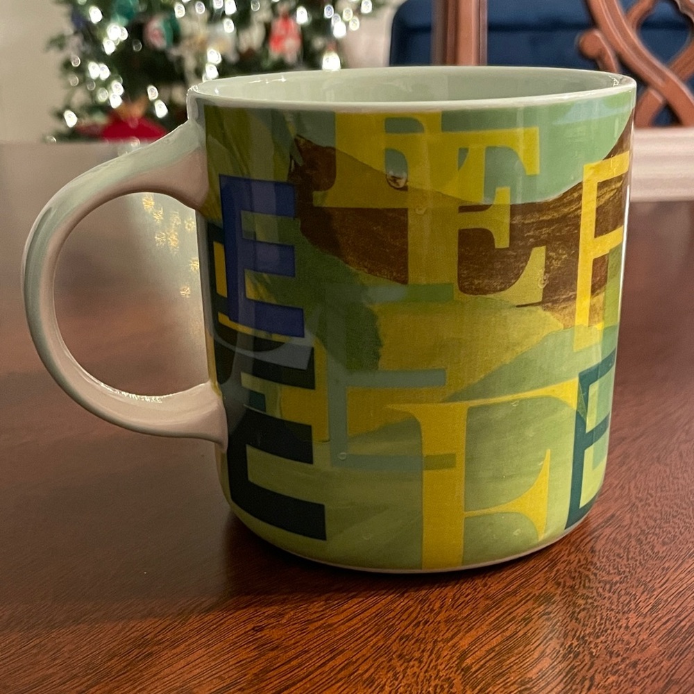 Anthropologie Lottie Monogram Mug with the letter "E".